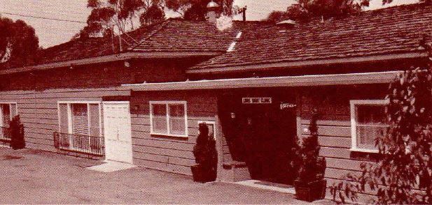This picture shows the original one story building, which was built out of natural redwood. The current building sits on the same footprint as this original building.
